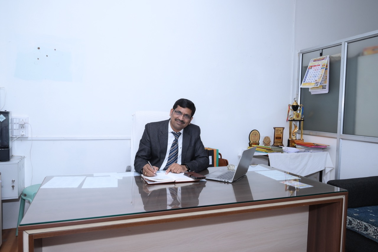 Dr. Suresh Somkuwar